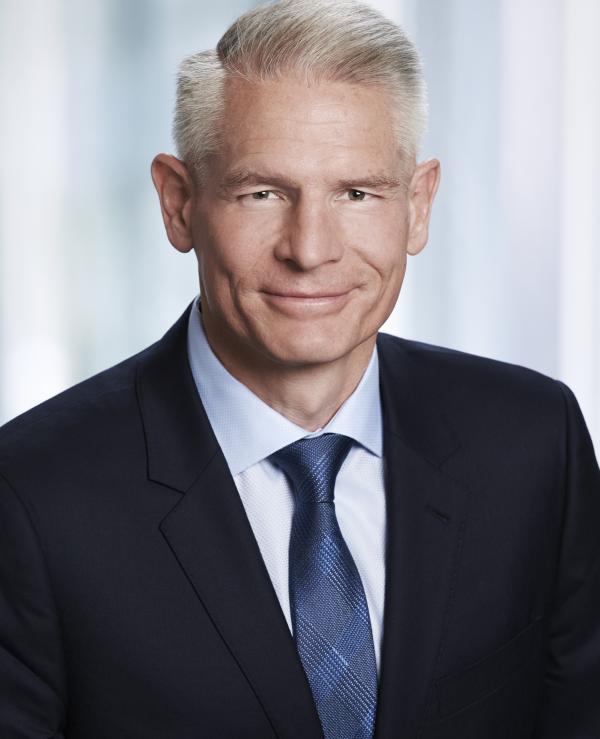 Mark E. White, CEO